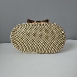Elegant Gold Clutch with Bow Accent